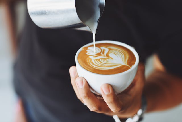 Person Performing Coffee Art